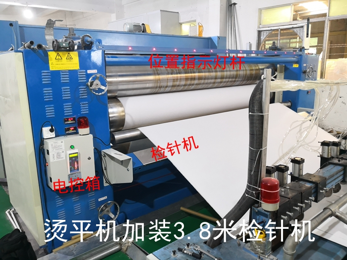 1565187620562824.jpg 恒新無(wú)紡布3.8米燙平機(jī)加裝檢針機(jī).jpg