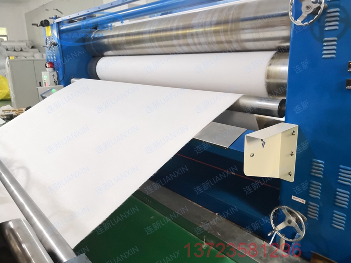1565187669516563.jpg 恒新無(wú)紡布3.8米燙平機(jī)加裝檢針機(jī)5.jpg